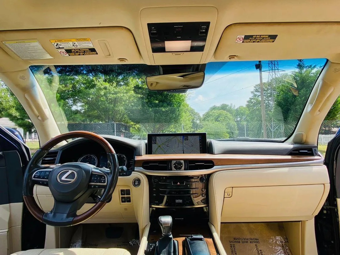 Lexus LX 570 tan leather dashboard with wood trim