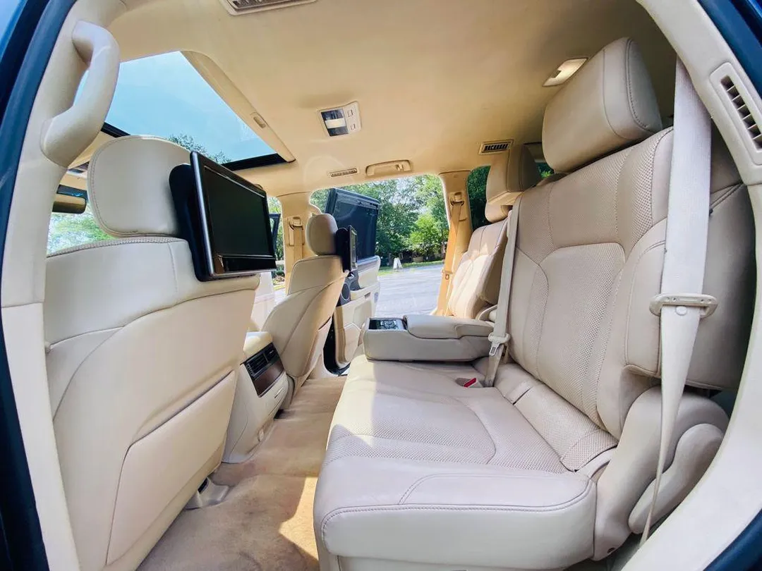Lexus LX 570 tan leather rear seats with entertainment screens